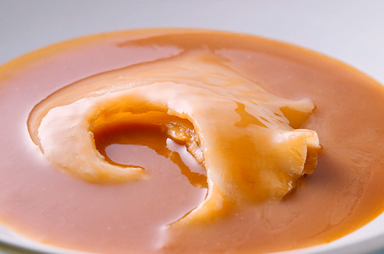 写真：濃厚な旨味が凝縮された秘伝のスープ